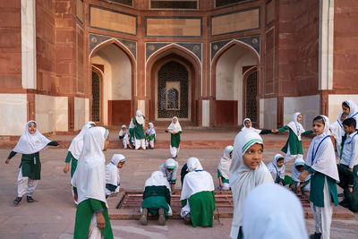 Group of people in front of building