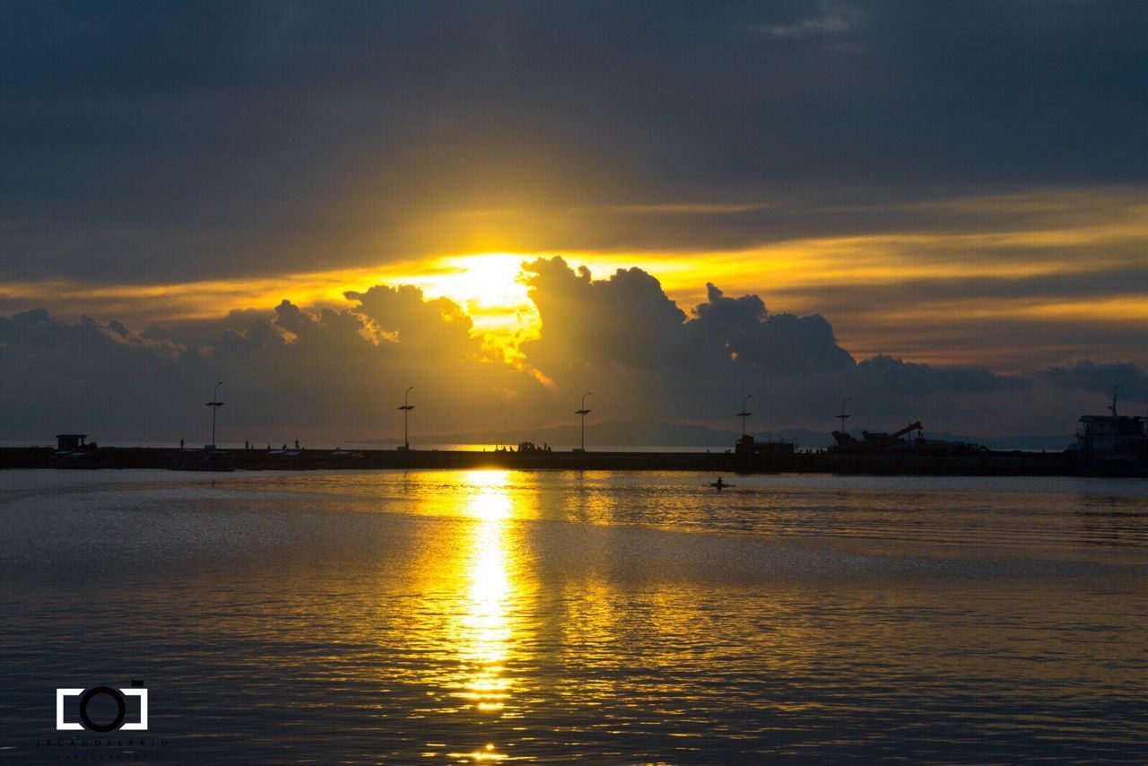 SCENIC VIEW OF SUNSET OVER SEA