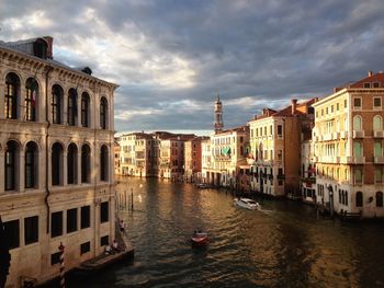 Canal passing through city buildings
