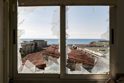 Buildings seen through window