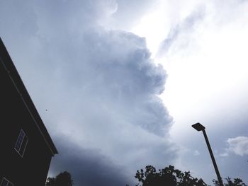 Low angle view of street light against sky