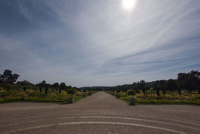 Pathway at trentham gardens against sky