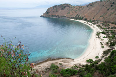 High angle view of cristo rei backside beach or dolok oan beach in dili, timor leste. 