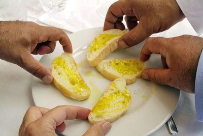 Midsection of man holding food