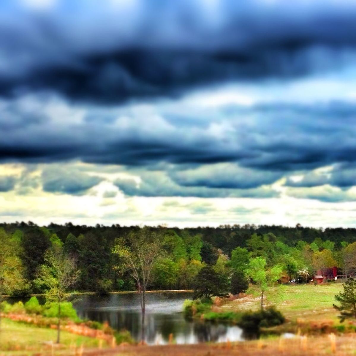 water, tranquil scene, sky, tranquility, lake, scenics, tree, cloud - sky, reflection, beauty in nature, cloudy, nature, cloud, landscape, waterfront, idyllic, river, non-urban scene, countryside, growth