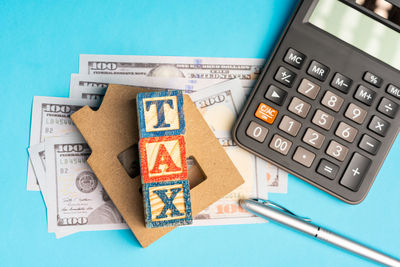 High angle view of information sign on table
