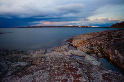 Scenic view of sea against sky during sunset