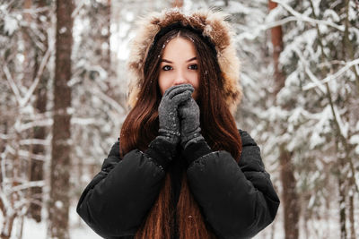 Portrait of young woman looking away