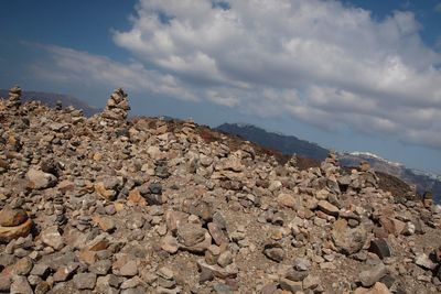 Rocks on land against sky