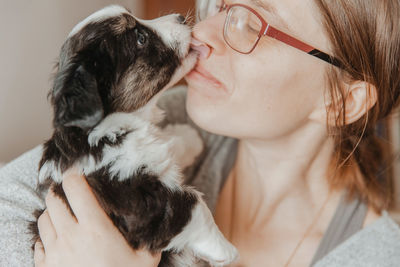 Close-up of woman with dog