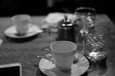 Close-up of coffee cup on table