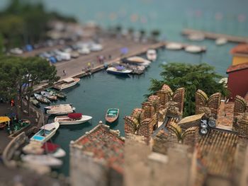 High angle view of boats moored at harbor