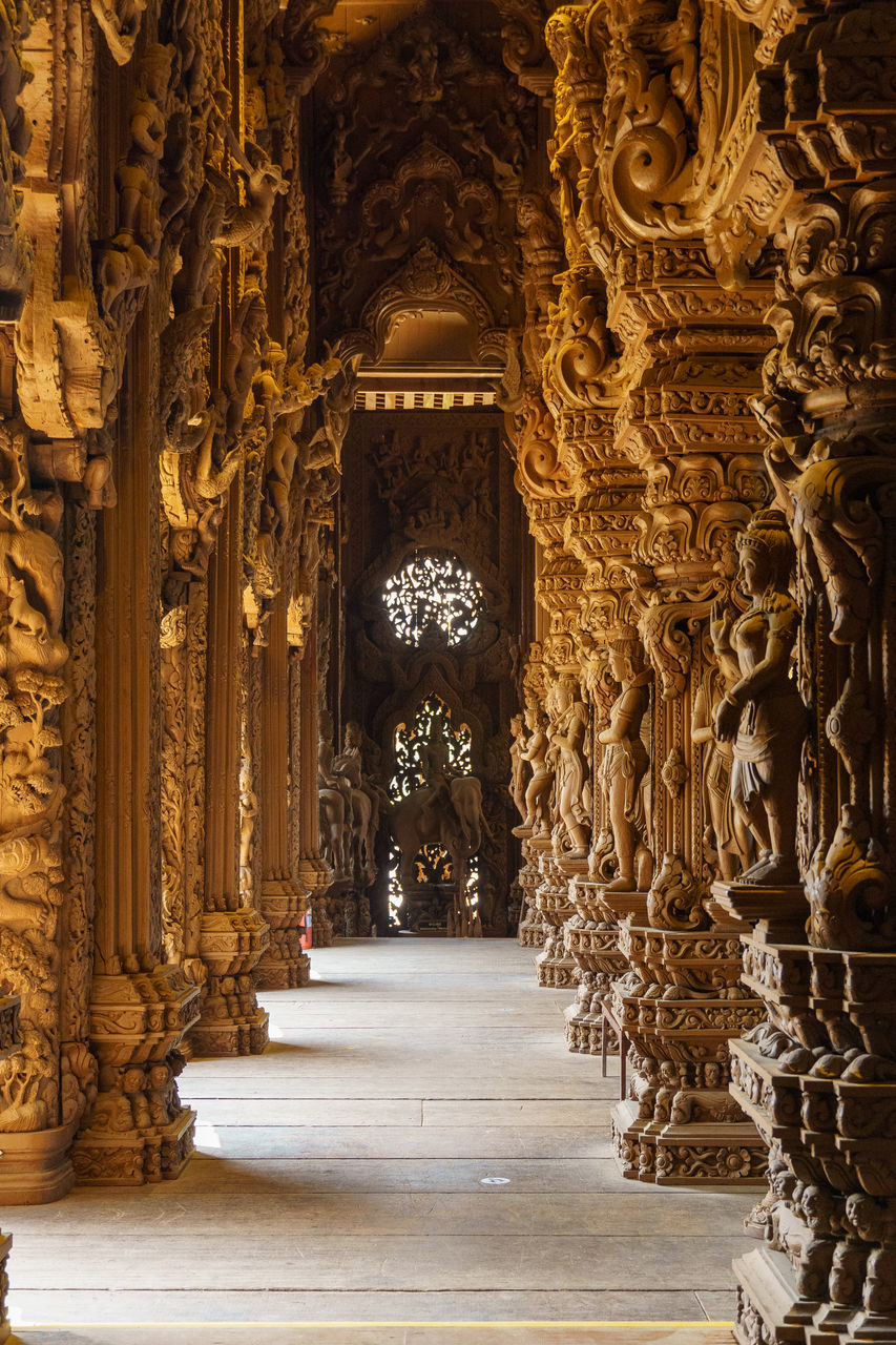 architecture, building, travel destinations, built structure, religion, temple, ancient history, history, belief, the past, travel, place of worship, worship, temple - building, tourism, palace, indoors, no people, spirituality, ornate, craft, gold, column, city, corridor, architectural column, arch, arcade, ancient