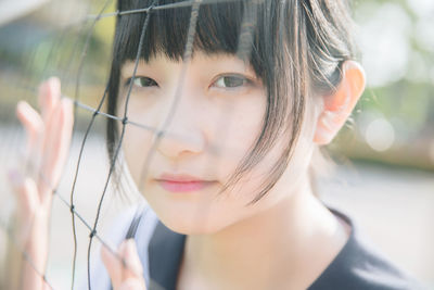 Close-up portrait of young woman