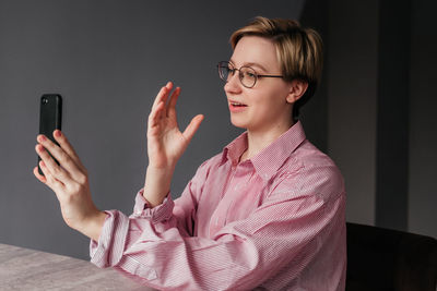 Young woman using mobile phone
