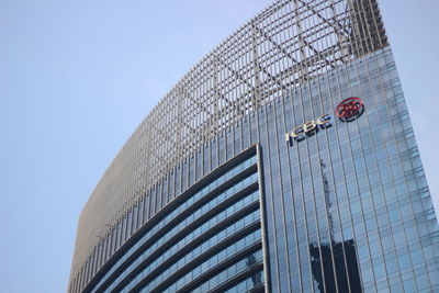 Low angle view of modern building against clear sky