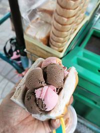 Midsection of person holding ice cream