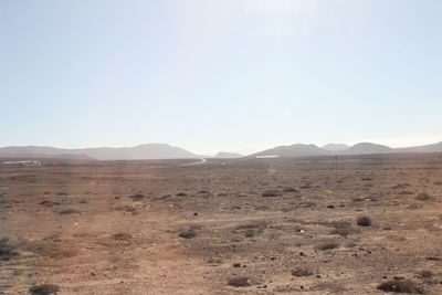 Scenic view of desert against clear sky