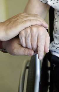 Close-up of people holding hands