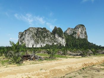 Rock formations on landscape against sky. cave at kuantan in pahang state. malaysia,