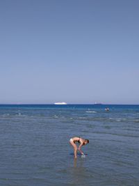 Scenic view of sea against clear sky