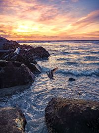 Scenic view of sea against sky during sunset