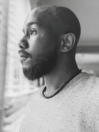 Portrait of young man looking away