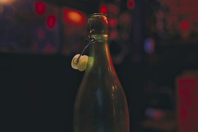 Close-up of beer glass bottle