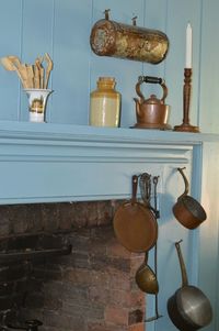 Kitchen utensils on mantle at home