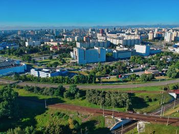 High angle view of buildings in city against sky