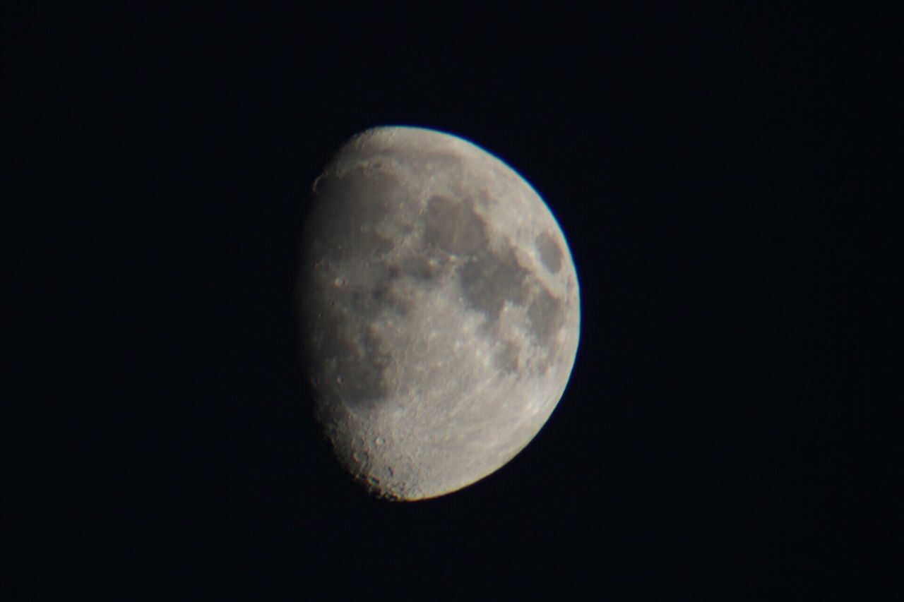 LOW ANGLE VIEW OF MOON AGAINST CLEAR SKY