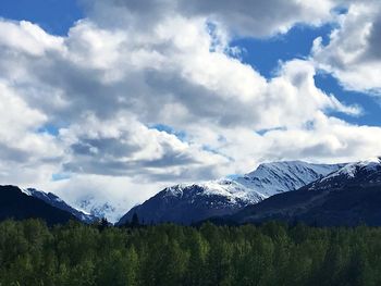 Scenic view of snowcapped mountains against sky