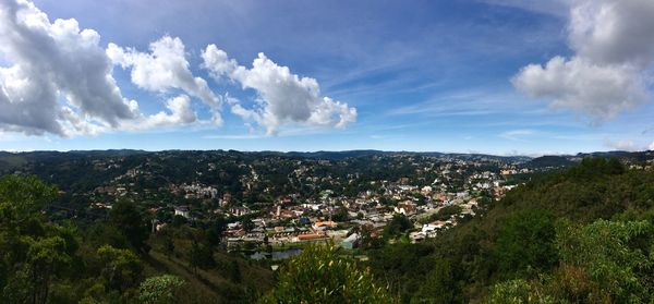 Panoramic view of trees against sky