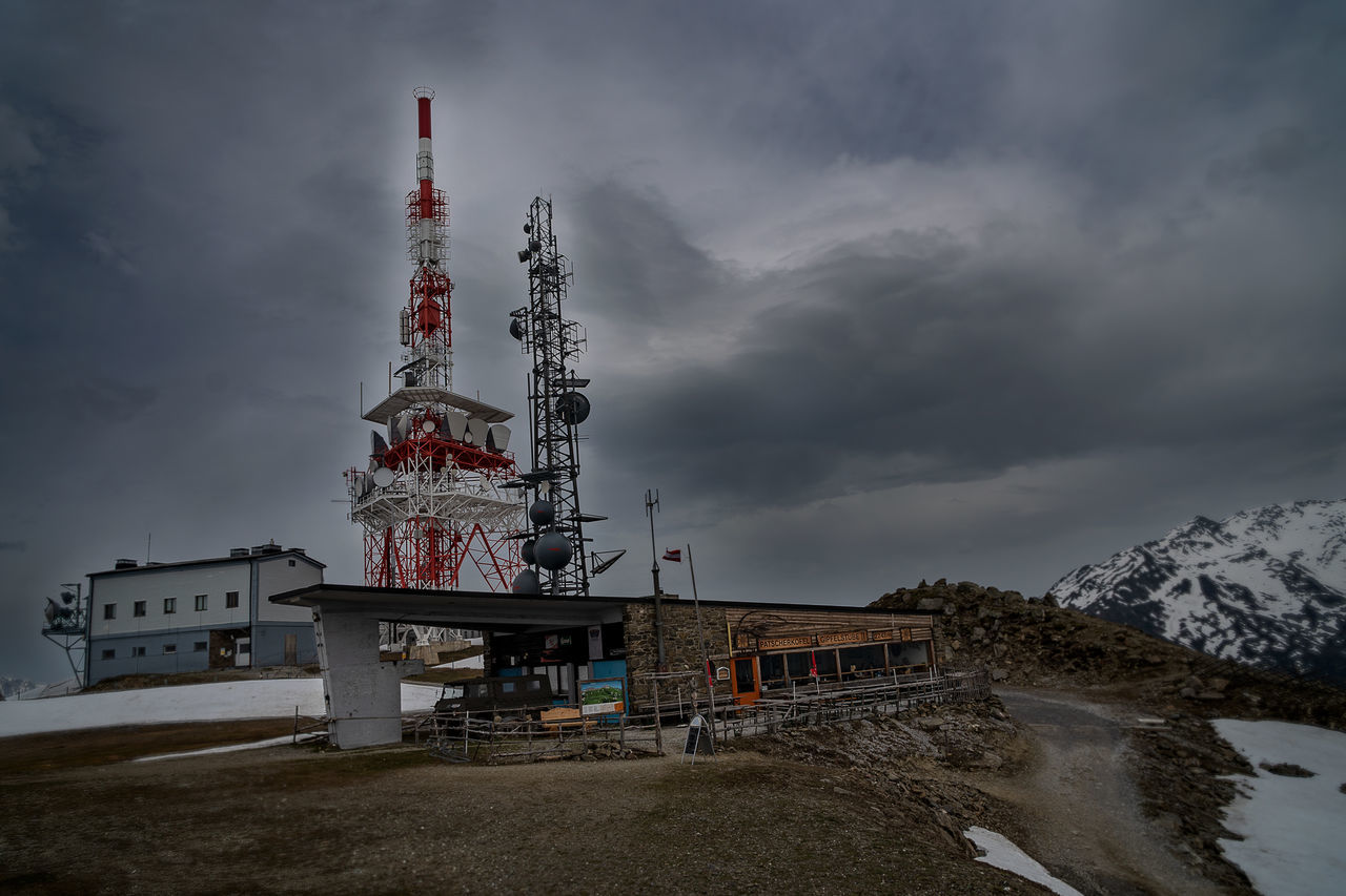 cloud - sky, sky, architecture, built structure, building exterior, nature, no people, industry, outdoors, tower, water, cold temperature, winter, day, overcast, travel destinations, snow, travel