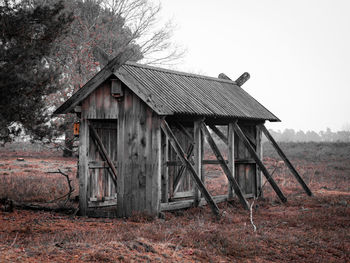 House on field against sky