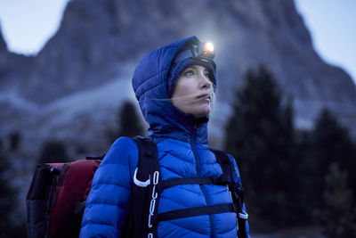 Close-up of woman on snow covered mountain