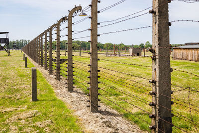 Barbed wire around the auschwitz-birkenau concentration camp. oswiecim, poland, 16 may 2022