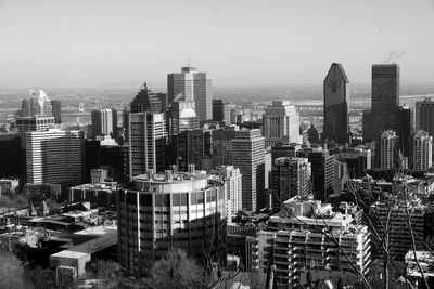 Aerial view of cityscape against clear sky
