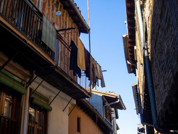 Low angle view of residential buildings against sky