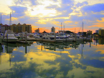 Boats moored at harbor