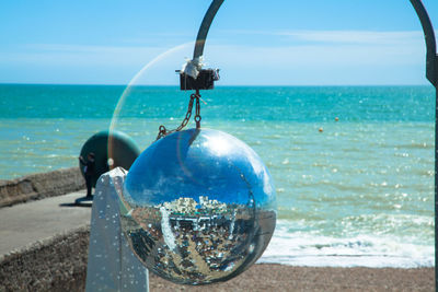 View of sea against blue sky