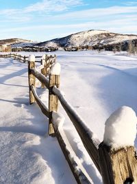 Scenic view of frozen lake against sky