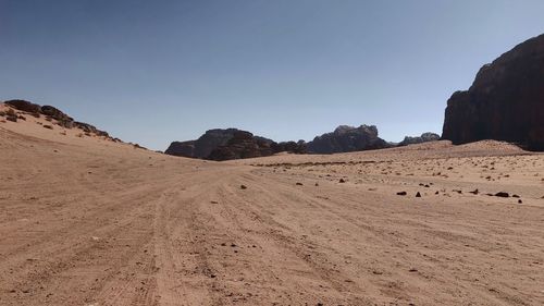 Scenic view of desert against clear sky