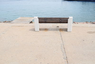 High angle view of footpath by sea