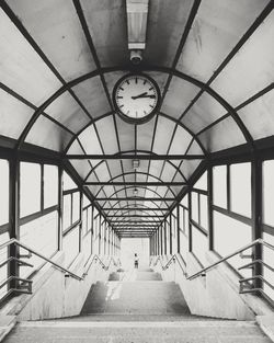 High angle view of clock hanging over steps