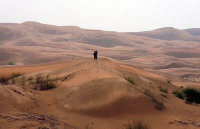 Scenic view of desert against sky