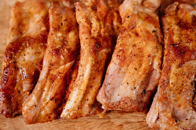 High angle view of meat on barbecue grill