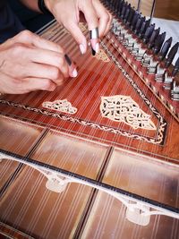 High angle view of person playing musical instrument