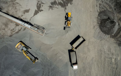 High angle view of people walking on road