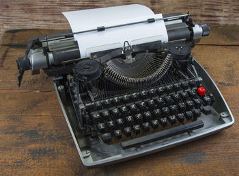 High angle view of old machinery on table